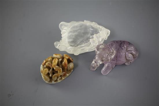 A Chinese jade hat finial and two rock crystal carvings, 4.1cm - 7cm